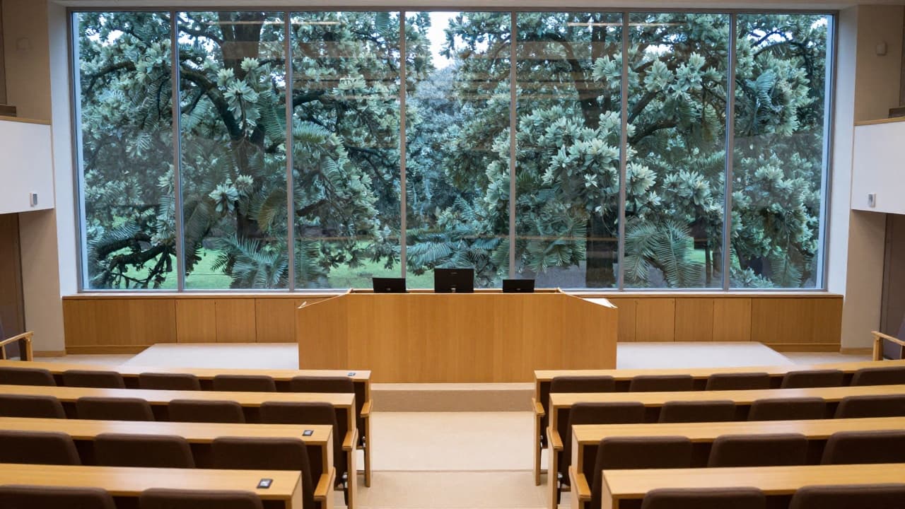 Empty parliamentary chamber with a view of the forest